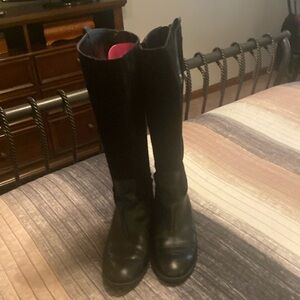 Black leather and suede riding boots.
